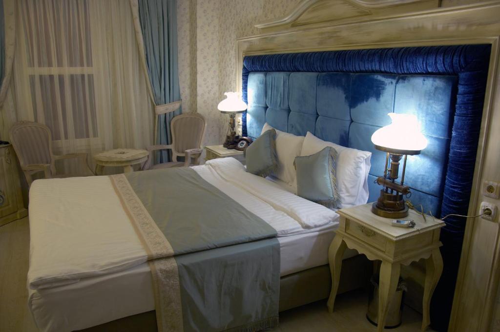 Trilyali Butik Hotel Tirilye Quarto foto