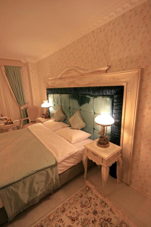 Trilyali Butik Hotel Tirilye Quarto foto